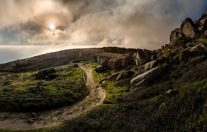 Trail near Biscaia, Lisbon, Portugal with clouds