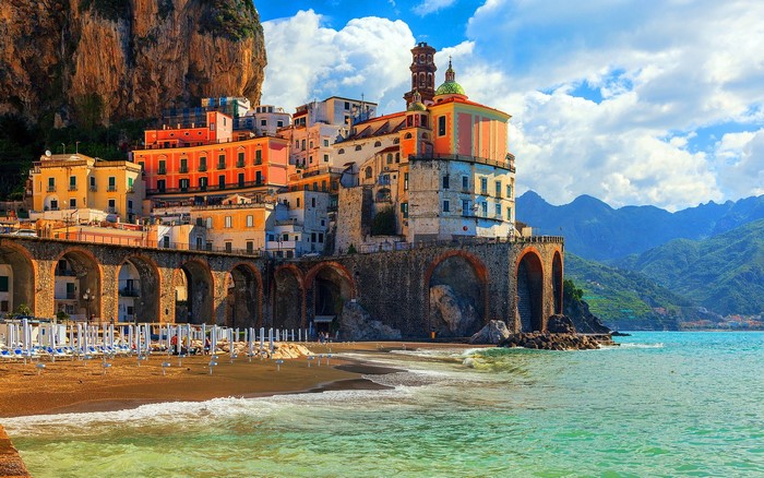 Colorful houses on a cliff overlooking the sea in Italy