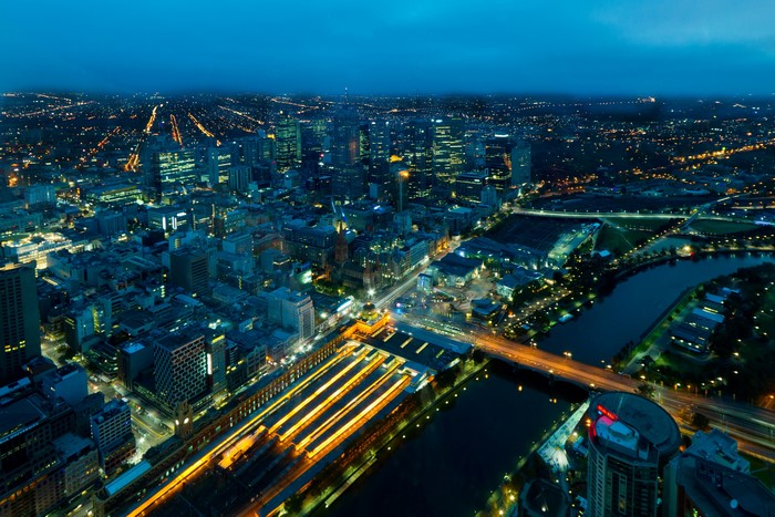 Aerial view of Melbourne at night with Yarra River