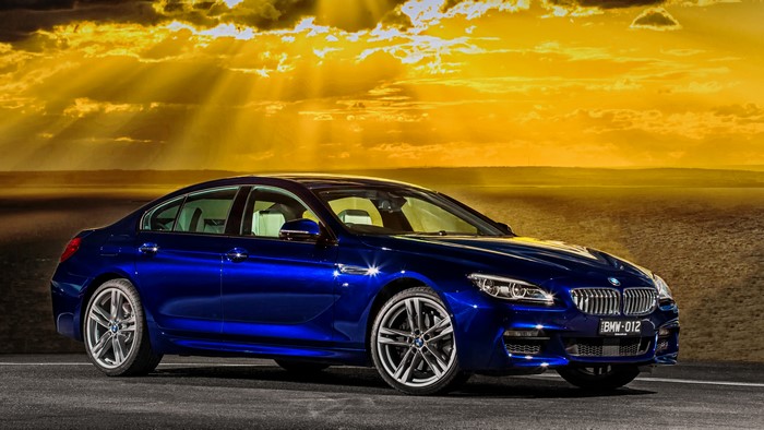 Blue BMW 6-Series Gran Coupe on a road
