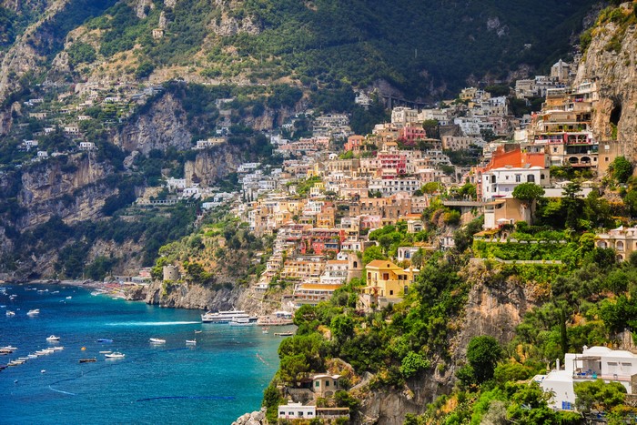 Positano, Italy houses on a steep cliffside overlooking the sea