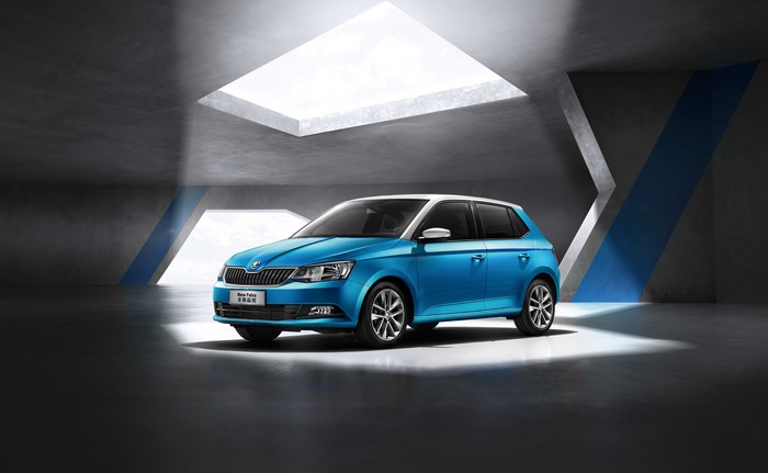 Blue Skoda Fabia in a modern garage