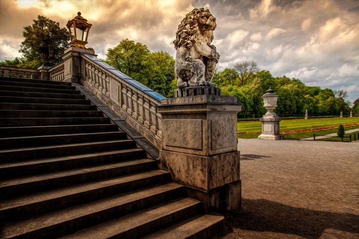 Stone Lion Sculpture and Grand Staircase in a Park