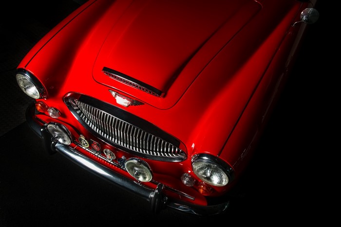 Red 1964 Austin Healey car front