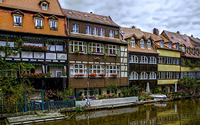 Row of historic houses along a river in Bamberg, Germany