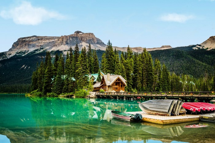 Emerald Lake Lodge with boats and mountains in Yoho National Park