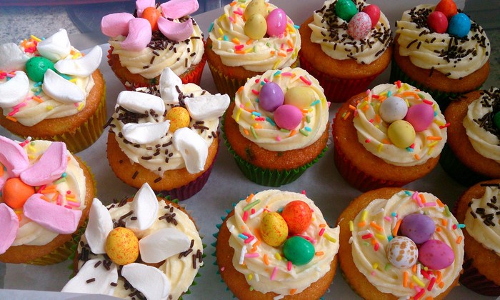Easter cupcakes with marshmallows and candy eggs