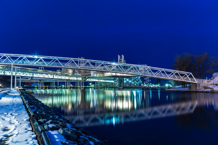 Bridge over water at night in winter, Ontario, Canada