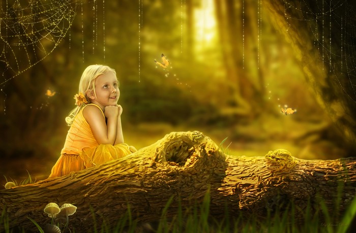 Girl sitting on a tree trunk with butterflies and a frog