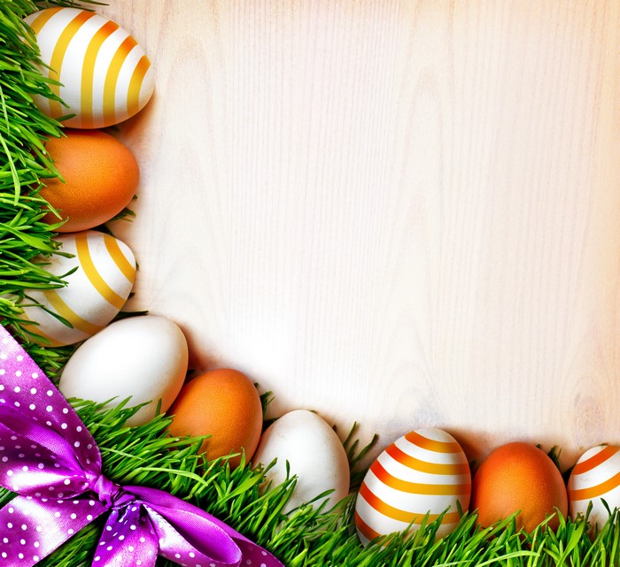 Easter Eggs on Grass with Purple Ribbon