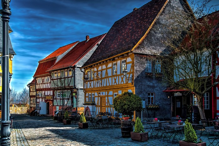 Half-timbered houses on a cobblestone street in Obernhain, Germany