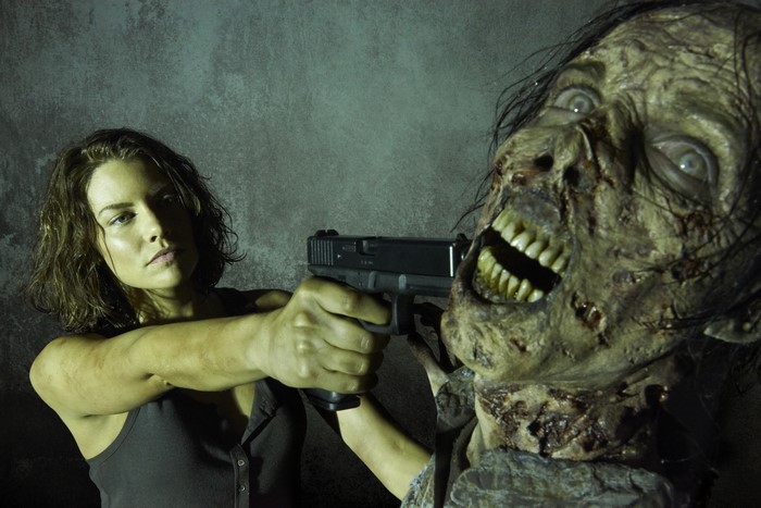 Lauren Cohan as Maggie Greene with a zombie in The Walking Dead