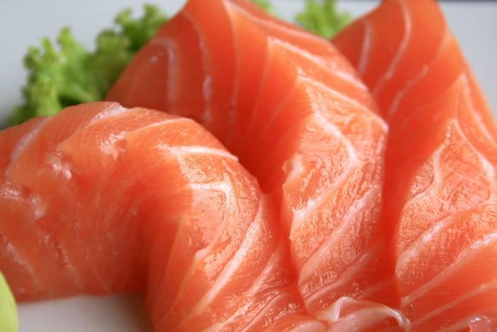 Closeup of fresh salmon sashimi slices
