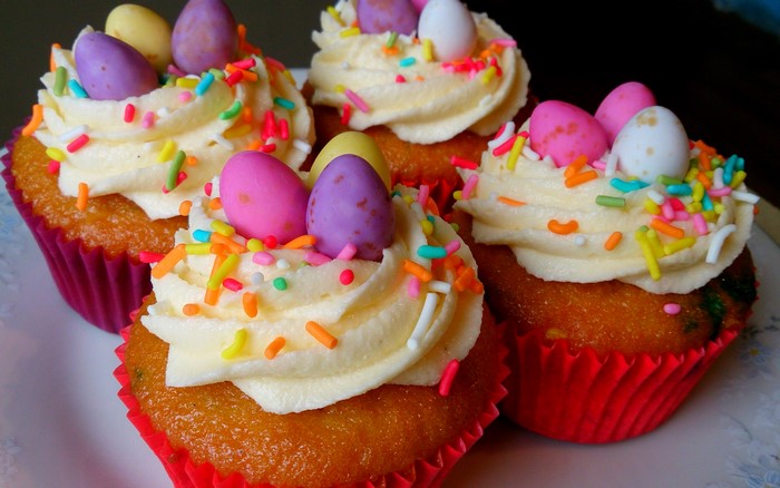 Easter cupcakes with frosting and candy eggs