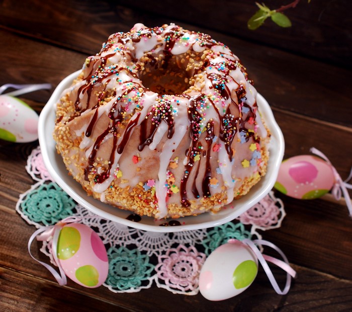 Easter cake with chocolate drizzle and sprinkles