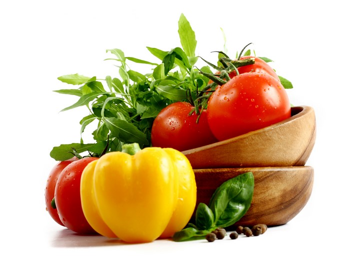 Tomatoes, Bell Pepper, and Greens with Wooden Bowls