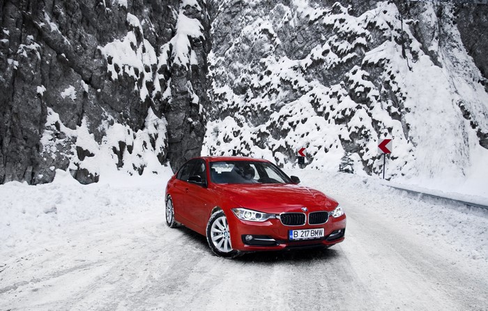 Red BMW 3 Series F30 320d in Snow
