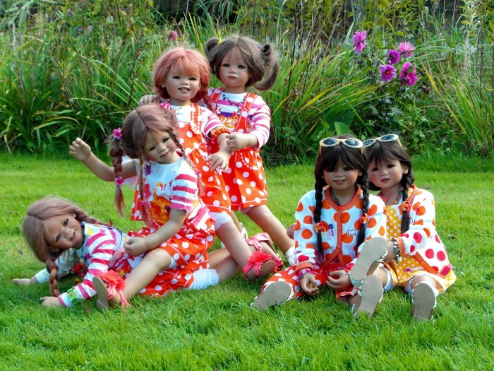 Dolls in a park setting