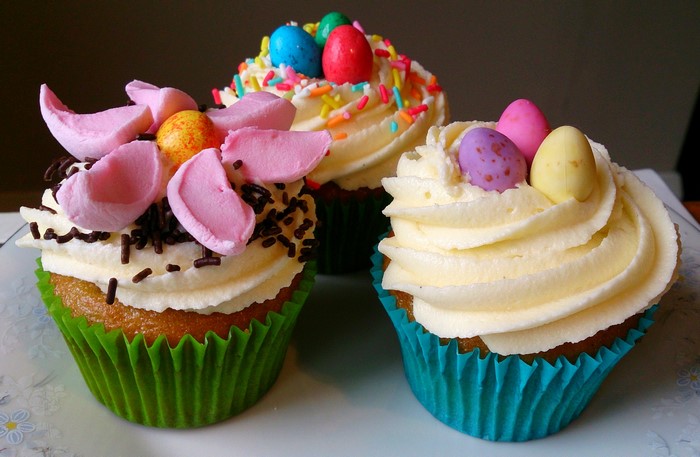 Easter cupcakes with frosting and candy eggs