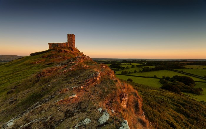 Brentor Church on Brent Tor, West Devon, England at sunset
