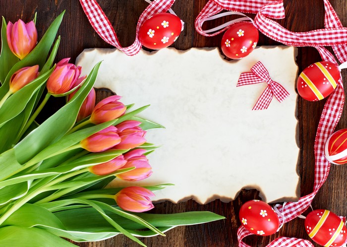 Easter Tulips, Eggs, and Ribbon on Wooden Background