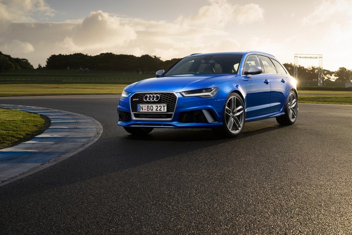 Blue Audi RS 6 Avant on a Race Track
