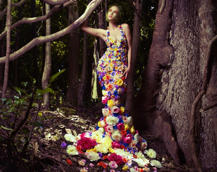 Woman in a floral dress in a forest