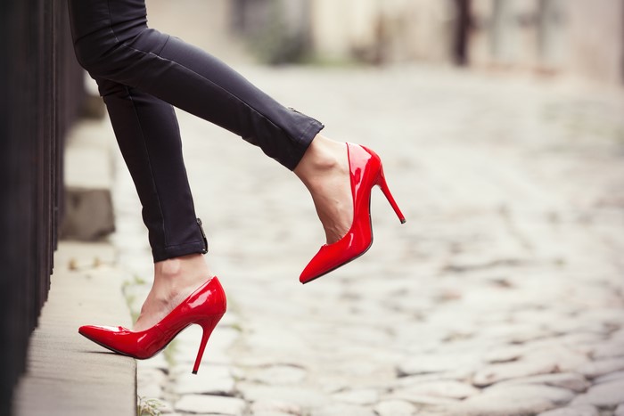 Legs in red stilettos
