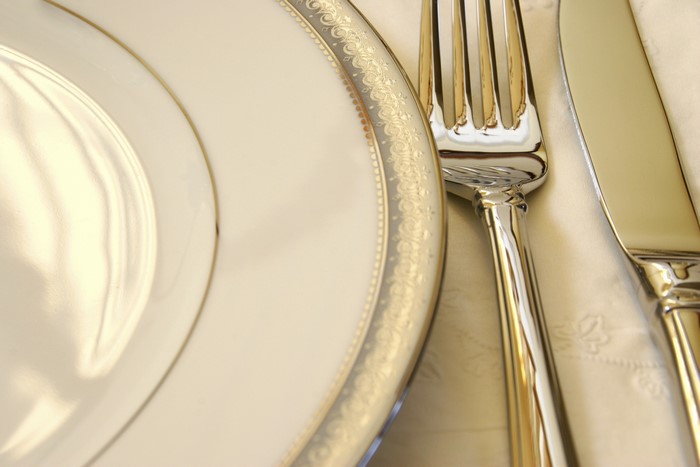 Elegant place setting with plate, fork, and knife