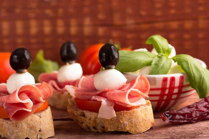 Ham and Mozzarella Bruschetta with Olives and Tomatoes