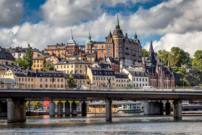 Stockholm cityscape with buildings and a bridge over a river
