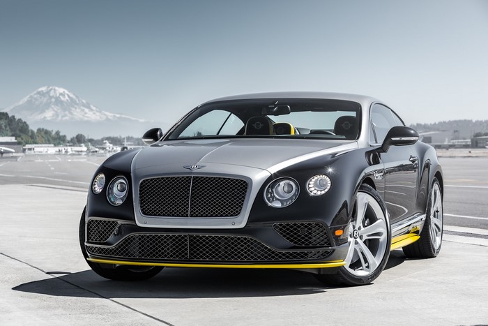 Bentley Continental GT on an airport tarmac with mountains