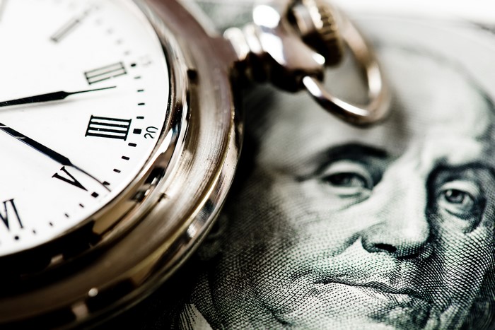 Pocket Watch on Benjamin Franklin Hundred Dollar Bill