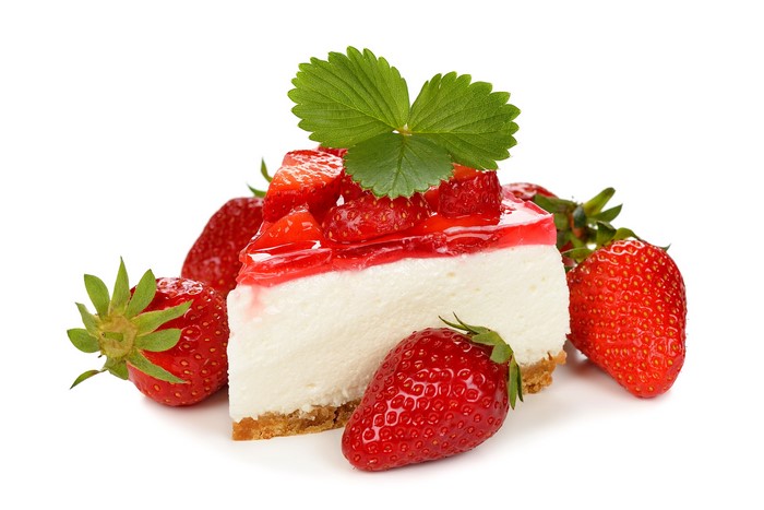 Strawberry cheesecake slice with fresh strawberries