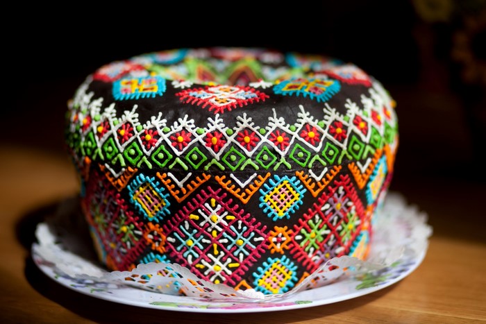 Decorated Kulich cake with traditional patterns
