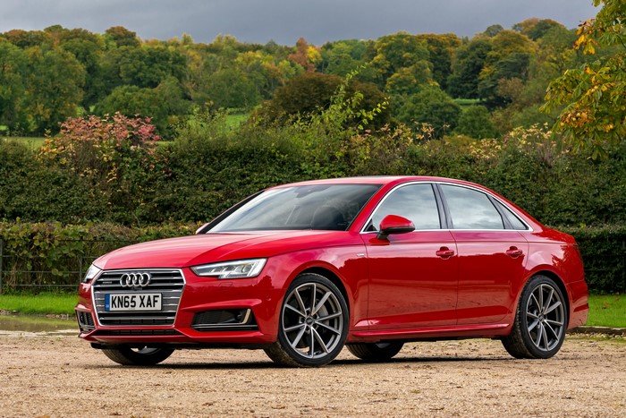 Red Audi A4 Sedan with KN65 XAF license plate