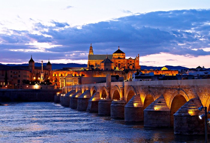 Roman Bridge and Mosque-Cathedral of Cordoba at dusk