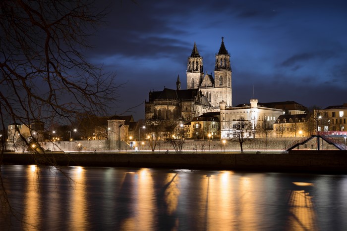 Magdeburg Cathedral at Night over River