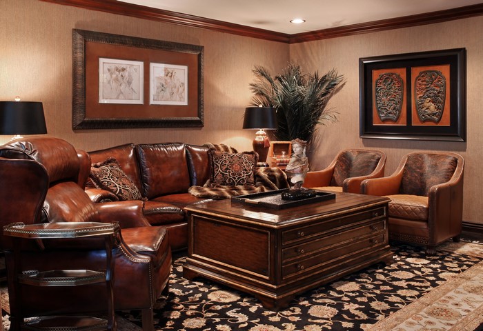 Living room with leather sofa and armchairs