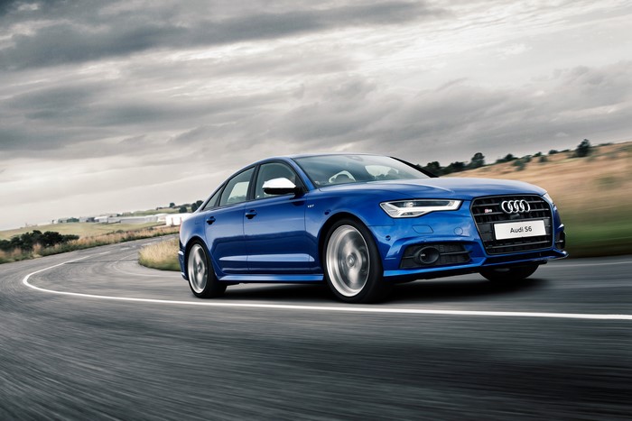 Blue Audi S6 Sedan in Motion