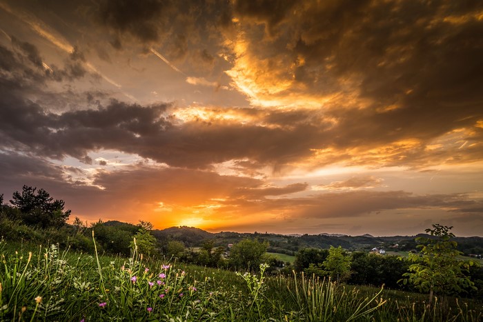 Sunset over rolling hills and fields in Croatia