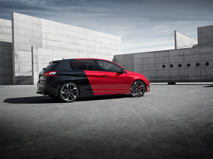Peugeot 308 GTi parked in a modern concrete setting