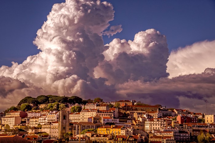 Lisbon cityscape with dramatic clouds