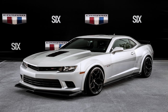 White Chevrolet Camaro Z/28 with "SIX" and "CAMARO" logos