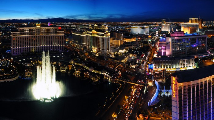 Las Vegas Strip at night with Bellagio fountains