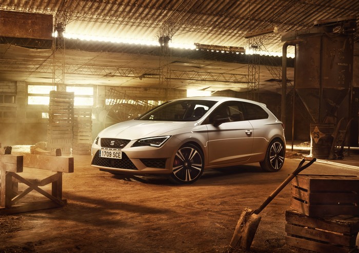 White 2015 Seat Leon in a warehouse