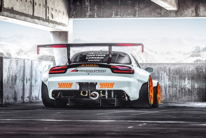 Mazda RX-7 with large rear wing and racing decals
