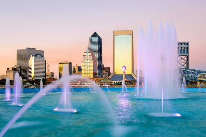 Jacksonville skyline with fountains at sunset