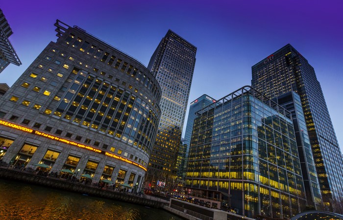 London skyscrapers at dusk with river