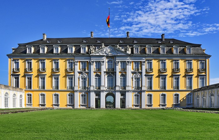Augustusburg Palace in Germany with a flag